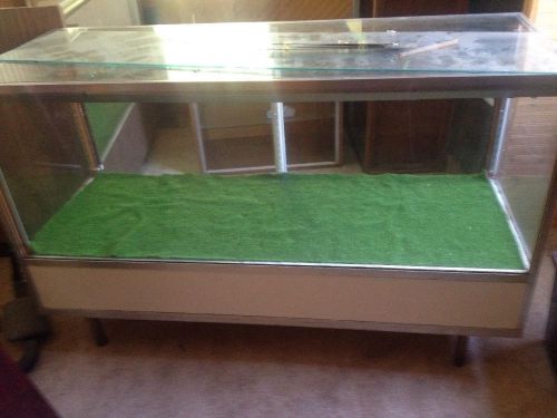 Retail glass shelving unit display case about 6ft long for sale