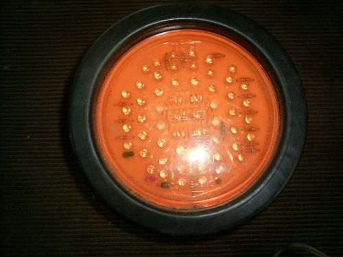 Used Maxxima M42100Y Amb 4&#034; Round Stop/Tail/Turn Light W/vinyl Mounting Grommet