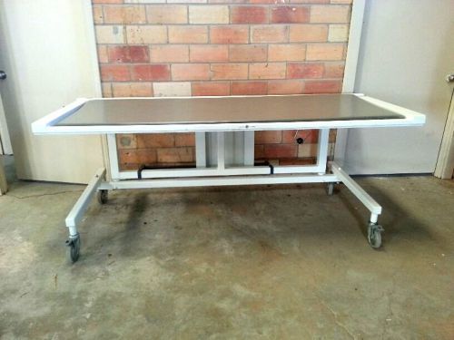 Ge general electric c-arm pain table, non-motorized, hi-lo, 4 way float top for sale
