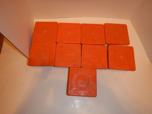 Used orange dirty vertical rebar safety cap qty. of 9 for sale