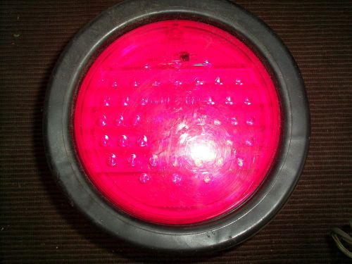 Used Maxxima M42100R Red 4&#034; Round Stop/Tail/Turn Light W/vinyl Mounting Grommet