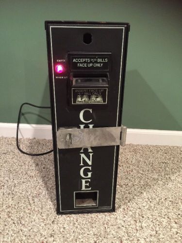 Change machine: $1 bill breaker.  tested and works perfect for sale