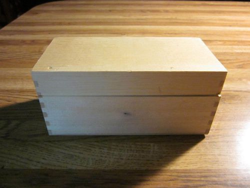 Two rectangular shaped wooden boxes with removable lids