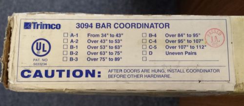 Trimco 3094 c-4 (over 95&#034; - 107&#034;) stop mounted door bar coordinator for sale