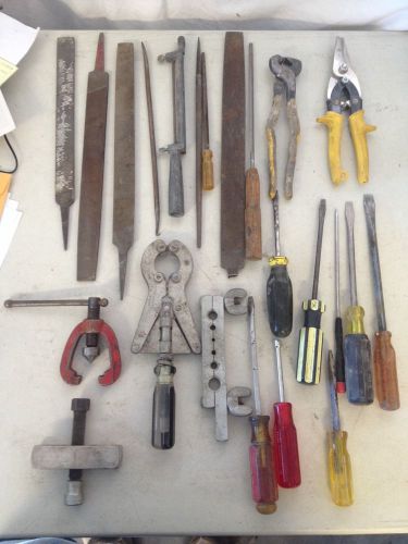 9 files 1 tile trimmer 1 tin snip 8 screwdrivers pipe cutter 2 clamp. for sale