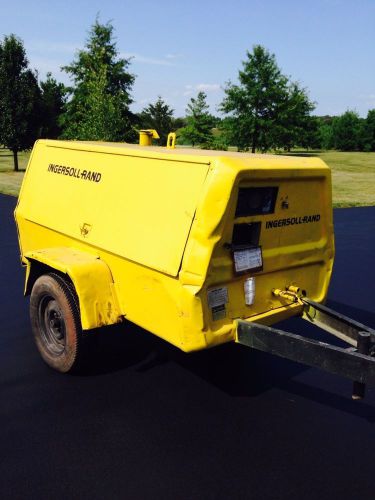 Ingersoll Rand 185 tow behind compressor.