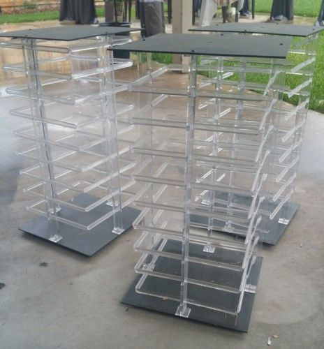 Acrylic rotating earring display stand revolving  used in good condition for sale
