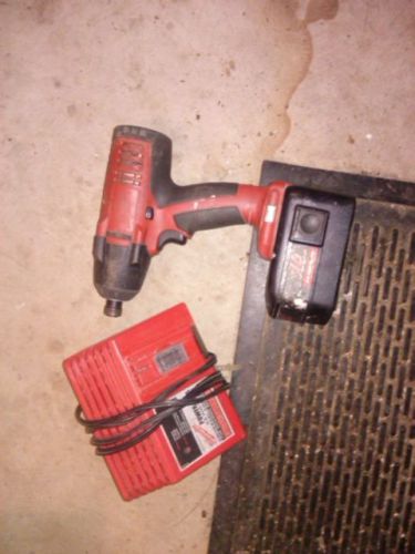 Milwaukee 18 volt cordless impact driver with good battery and charger! NICE