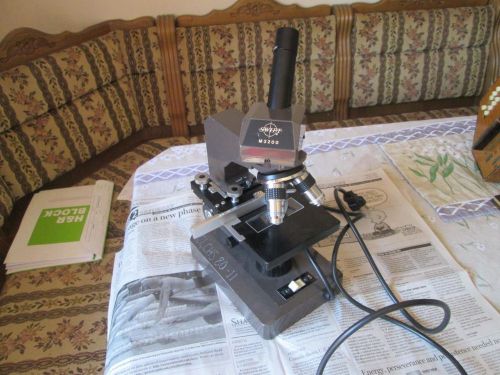 Swift M3200 Microscope 3 Lens Lighted and adjustable Table