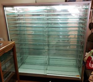 Large Glass Display Case, 14 Glass  Shelves, Mirrored Back, in Perfect Condition