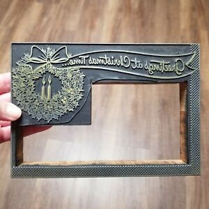 Vintage Letterpress Printing Block Greetings At Christmas Time with Wreath