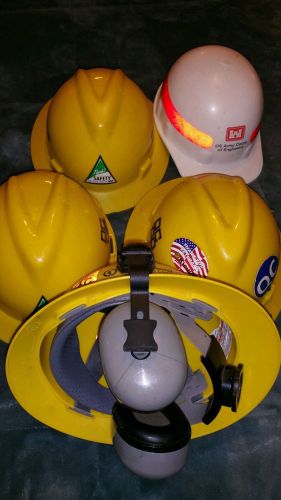 Lot of 5 Safety Hard Hats, one with ear muffs, pre owned, adjustable, Work