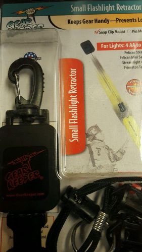 Gear keeper flashlight retractor for sale