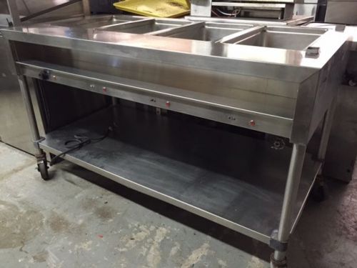 Delfield EHEI 60C Electric 4 Well Steam Table on Casters