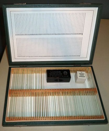 Various sizes microscope glass slides in wooden latched case for sale