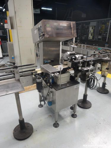 Used- Garvens Model SL3PM belt sytle aerosol can checkweigher. Capable of speeds