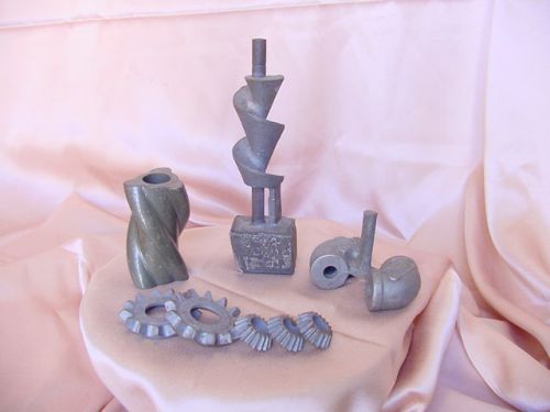 Vintage metal casting samples gears elbows rods ect. westran corp paperweights for sale