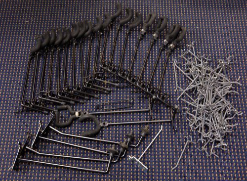 Slatwall/pegboard guitar hanger, cymbal and straight hooks lot of 100+ used for sale