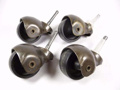 Lot of 4 Vintage Brass Hooded Casters 1 3/4&#034; Hard Plastic Wheels Grip Neck Stem