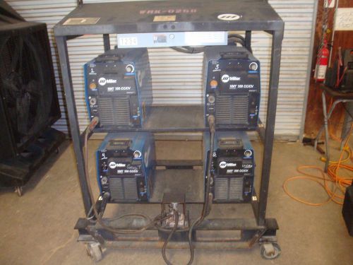 2009 Miller XMT350 4 Pack Electric Welders w/ Rack