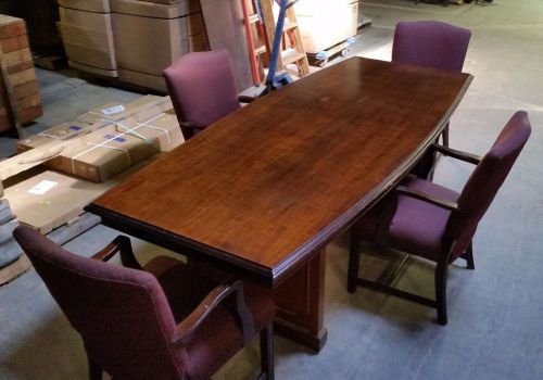 8 ft mahogany veneer conference table with 4 cloth covered  chairs (boat shaped) for sale