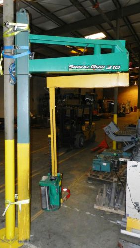 Signode 310 spiral grip semiautomatic overhead stretch wrapper for sale