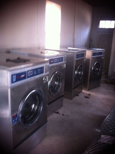 Four Dexter 40 lb. commercial washers. 3 phase