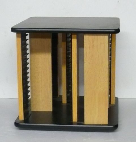 Revolving cd display rack &gt; spinning wooden rack &gt; holds 64 cd&#039;s for sale