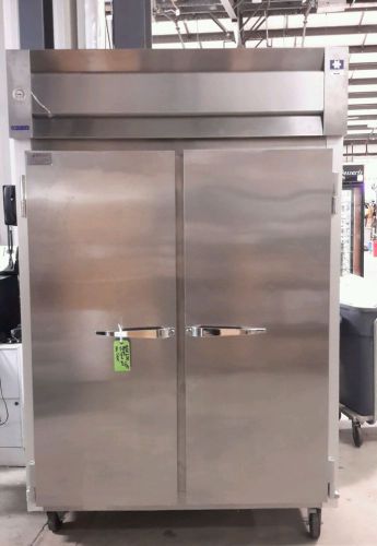 Used Commercial McCall 55&#034; Two Solid Door Freezer With Casters