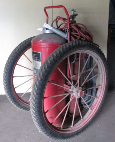 Vintage fire extinguisher rolling cart  class b / c fire wheels for sale