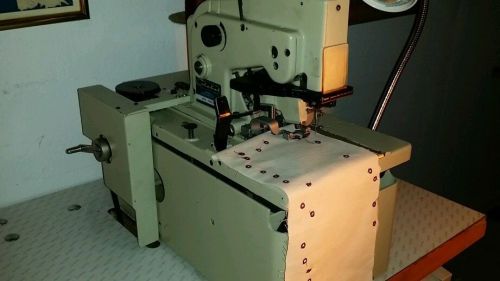 Eyelet sewing machine