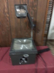 EIKI 3870 A   over head transparency projector  (w 1 working used bulb )