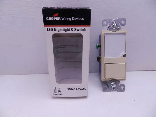 Cooper wiring devices 7738w-box 15-amp 120-volt ivory switch w/ led nightlight for sale