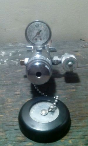 Flynn manifold oxygen regulator with gauge and thermo brand tank opening tool for sale