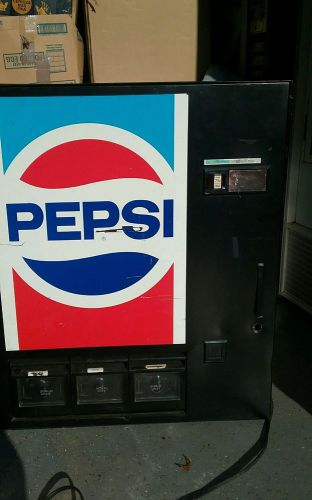 2 wall mounted soda vending machines 1 pepsi