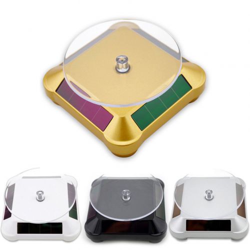 New solar showcase 360 turntable rotating jewelry watch ring display stand iy for sale
