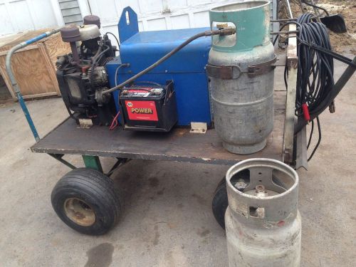 Miller aead-200le ac/dc arc welder generator with cart/2 tanks for sale