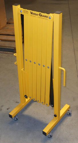 Versa-guard heavy duty yellow black expanding portable barricade w/ signs usg for sale