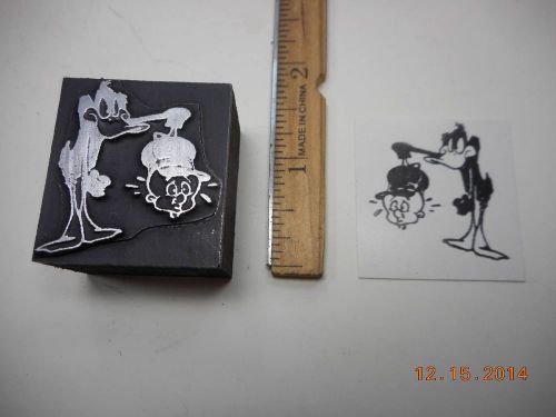 Letterpress Printing Printers Block, Angry Daffy Duck holds Elmer Fudd Head