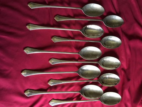 Nine Heavily Used Long Handled Serving Spoons