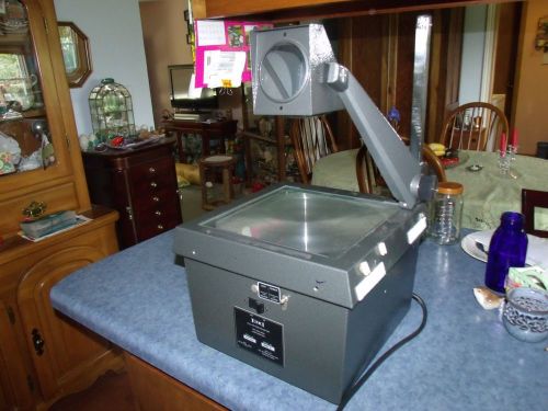 EIKI 3850A OVERHEAD TRANSPARENCY PROJECTOR turns on needs light