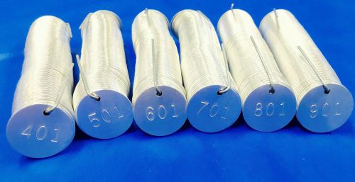 Round aluminum tags, numbered, 1-1/4” dia., 601-1,000 for sale