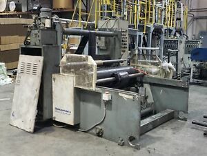 Used 54 Wide Battenfeld Gloucester Surface Winder. Model 1021, New 2002. Has Au