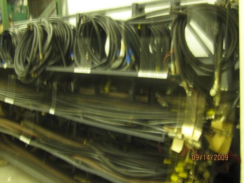 153 used parker hydraulic hoses  + hose rack for sale