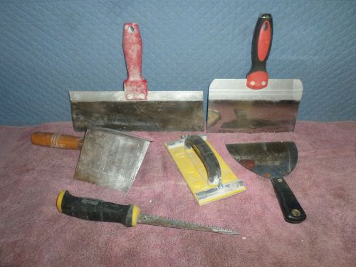 Mixed lot of drywall tools, blades, saw, sander. used and good to go.