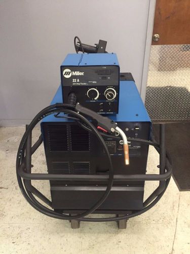 Miller cp-302 mig welder with wire feeder, accessory package, and cart (951230) for sale