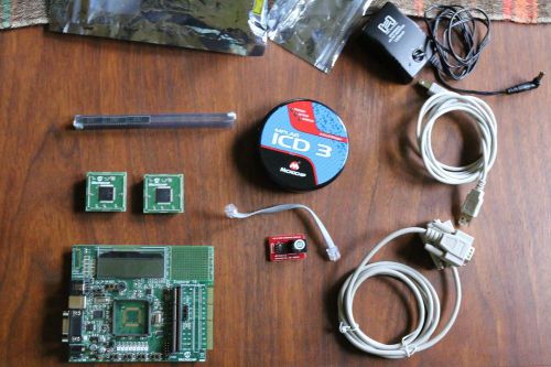 MICROCHIP -- Explorer 16 + ICD 3 + AC Adaptor + additional dsPIC33 samples