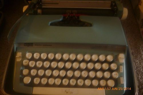 Smith Corona Sterling blue portable typewriter with hard case, non electric