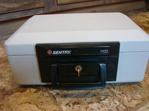 Sentry safe 1100 all purpose keylock fire proof storage safe` with key for sale