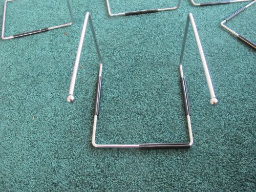 Five restaurant table top Crome pizza racks